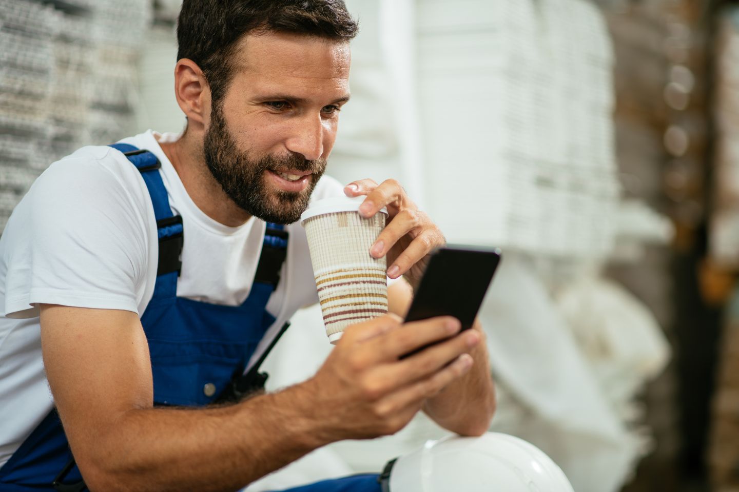man checking phone