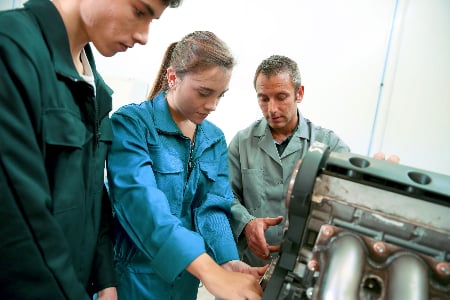 Automotive workers looking to solve a problem